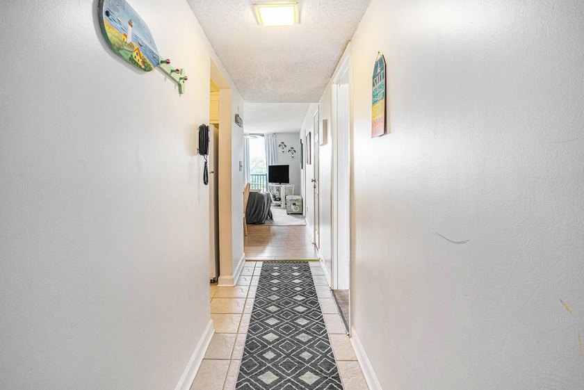 Welcome to Holiday Tower! This 2 bedroom, 2 bath condo would - photo 4