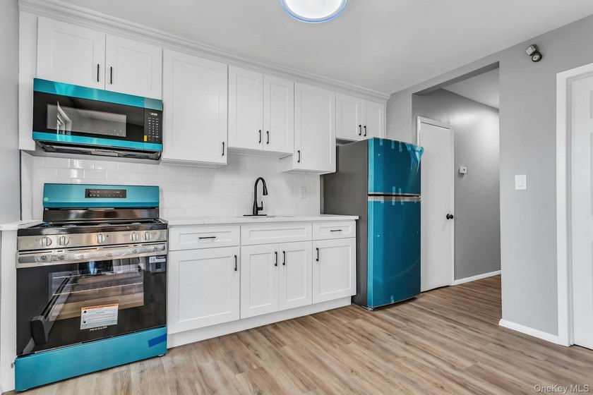 Welcome to 171-38 105 Avenue, a beautifully renovated two-family - photo 9