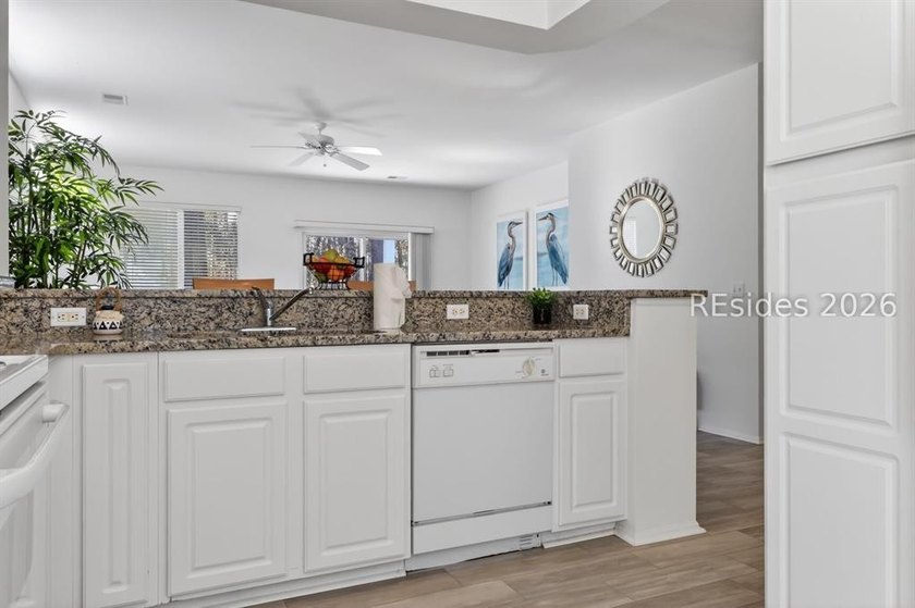 Experience the ultimate Lowcountry lifestyle in this lovingly - photo 5