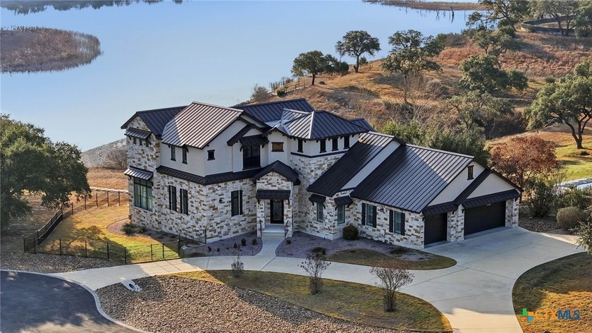 Experience true lakefront living in this stunning custom home - photo 2