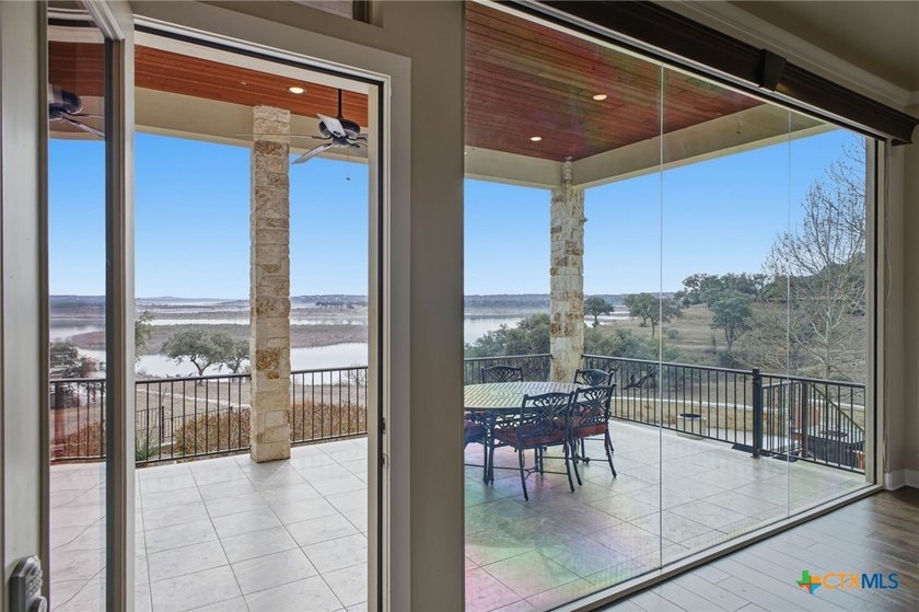 Experience true lakefront living in this stunning custom home - photo 6