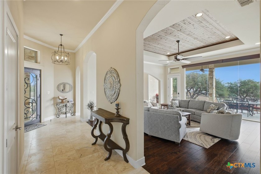 Experience true lakefront living in this stunning custom home - photo 8