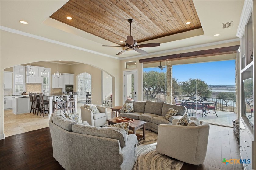 Experience true lakefront living in this stunning custom home - photo 9