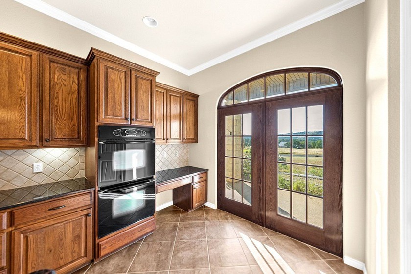 Nestled in the rolling hills of the Texas Hill Country, custom - photo 14