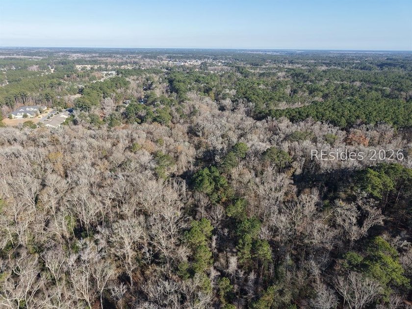 5.86 acre residential lot on Old Miller road, mature trees and - photo 2