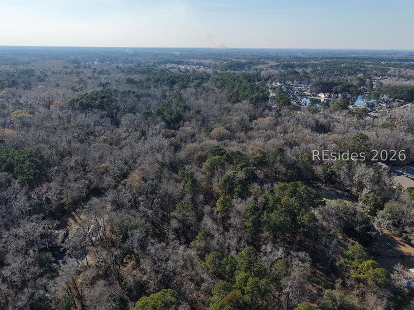 5.86 acre residential lot on Old Miller road, mature trees and - photo 7