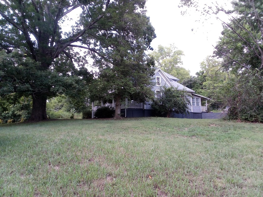 Farmhouse with acreage! Motivated Seller! Make offer on all or - photo 7