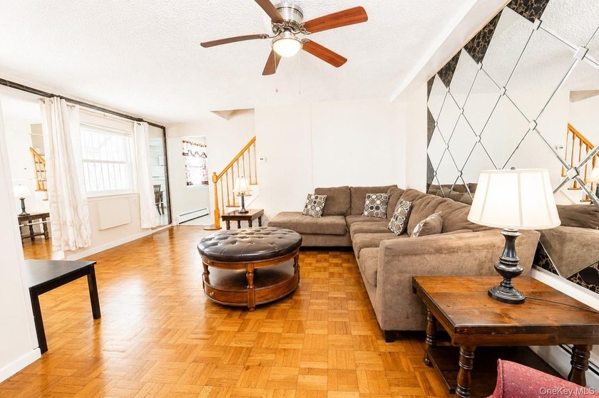 After 45 years, this charming semi-detached brick townhouse is - photo 5