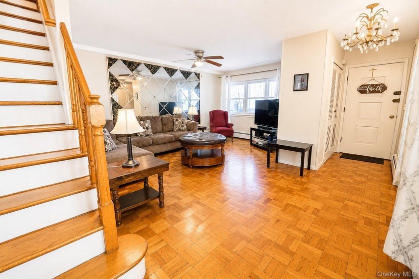 After 45 years, this charming semi-detached brick townhouse is - photo 6