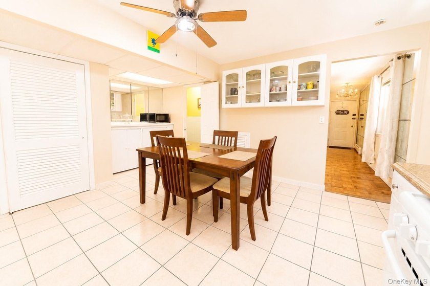 After 45 years, this charming semi-detached brick townhouse is - photo 9