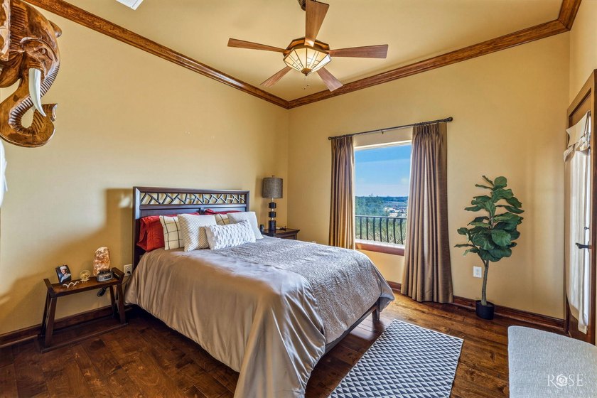 Perched above the tranquil waters of Lake Nasworthy just outside - photo 40