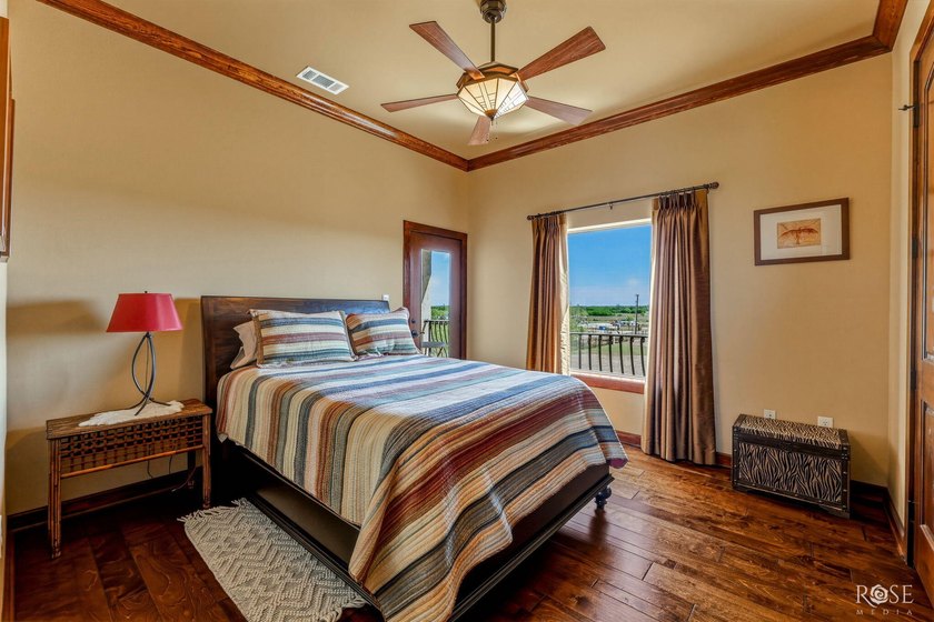 Perched above the tranquil waters of Lake Nasworthy just outside - photo 42