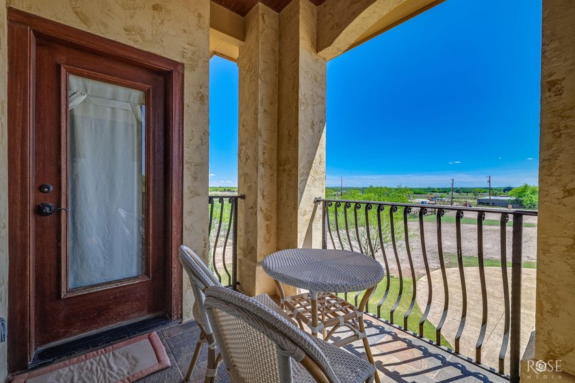 Perched above the tranquil waters of Lake Nasworthy just outside - photo 43