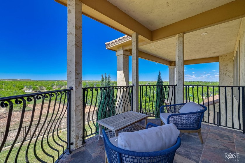 Perched above the tranquil waters of Lake Nasworthy just outside - photo 45