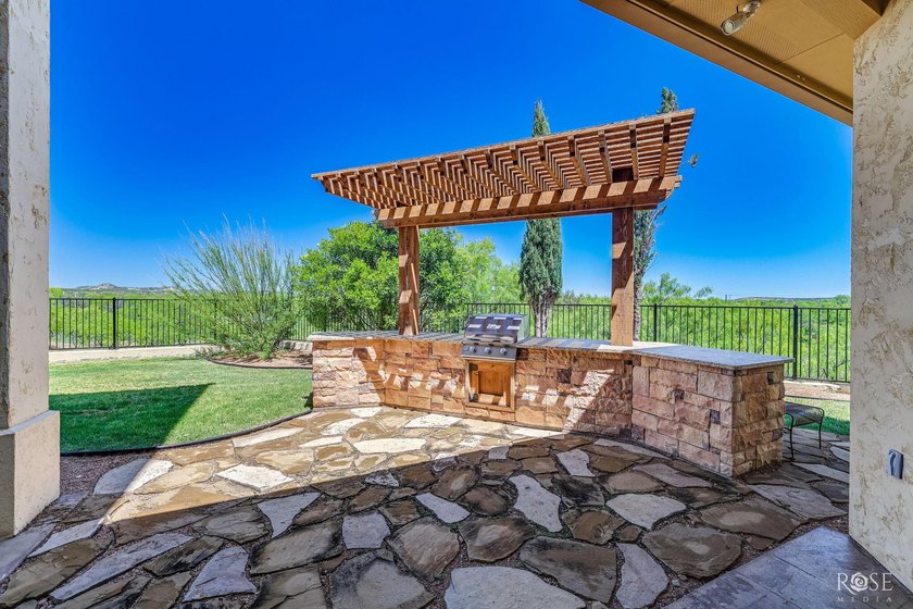 Perched above the tranquil waters of Lake Nasworthy just outside - photo 50
