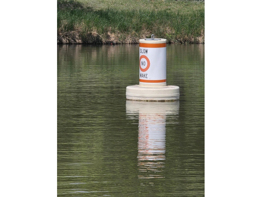Perched above the tranquil waters of Lake Nasworthy just outside - photo 58