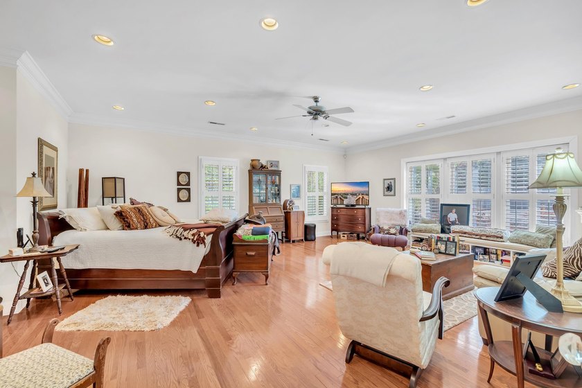 Situated beneath towering oak trees on a secluded one-acre - photo 5