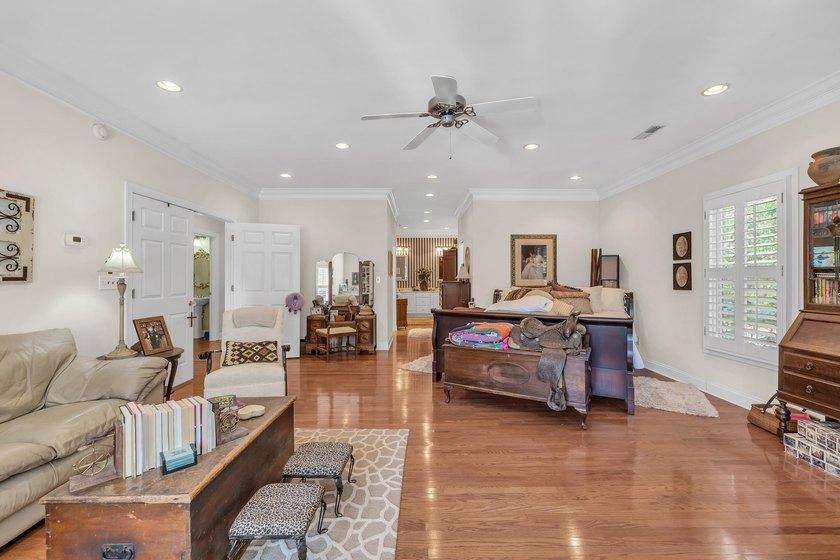 Situated beneath towering oak trees on a secluded one-acre - photo 7