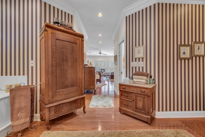 Situated beneath towering oak trees on a secluded one-acre - photo 8