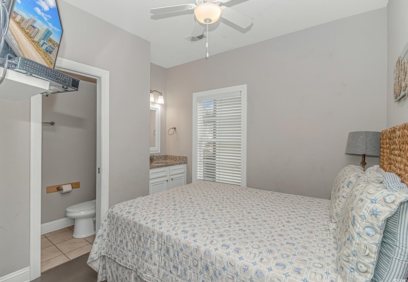 This very open and spacious 5-Bedroom, 5-Bath raised beach house - photo 15
