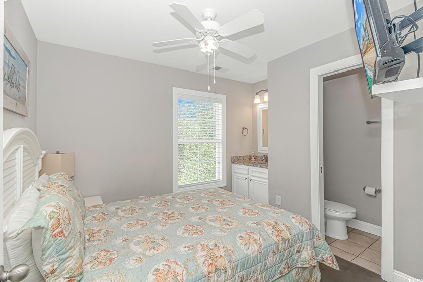 This very open and spacious 5-Bedroom, 5-Bath raised beach house - photo 17