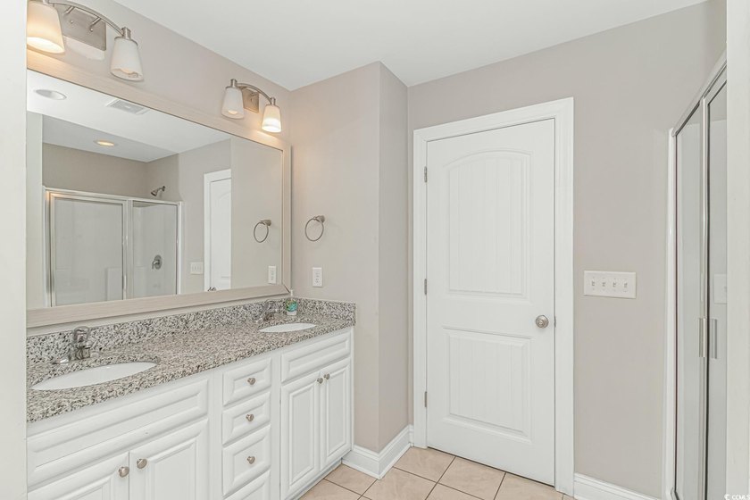This very open and spacious 5-Bedroom, 5-Bath raised beach house - photo 25