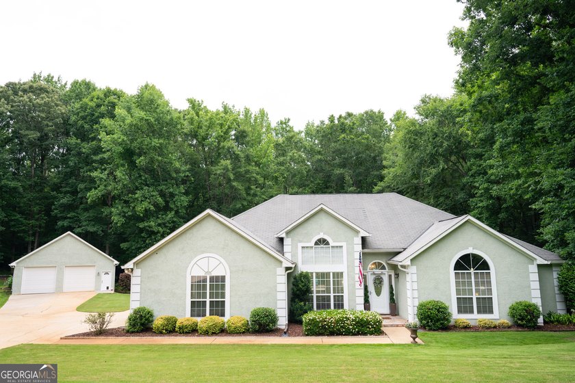 Welcome home to this beautifully maintained 4-bedroom, 2-bath - photo 2