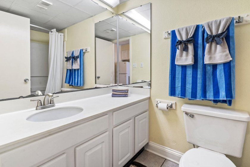 This well-cared for 10th floor sanctuary can either function as - photo 6