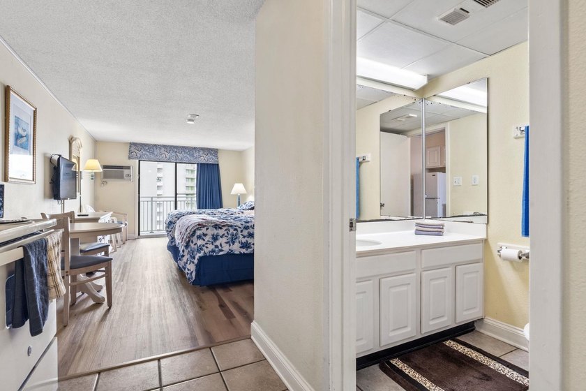 This well-cared for 10th floor sanctuary can either function as - photo 8