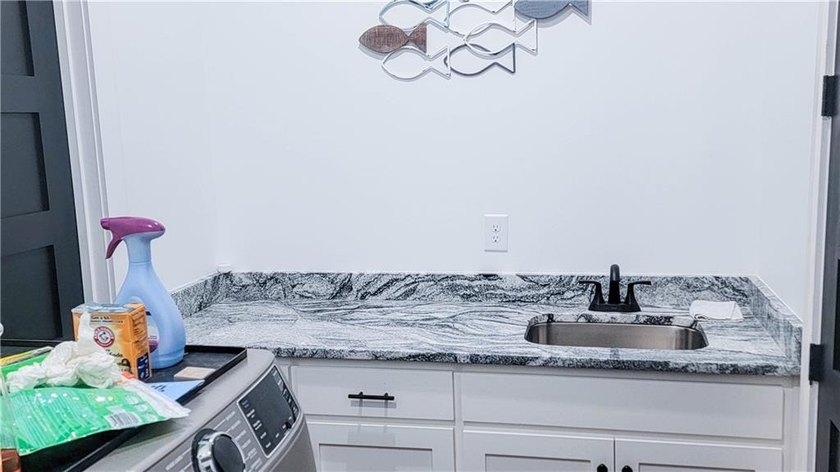 Welcome to your dream waterfront sanctuary on the highly coveted - photo 22