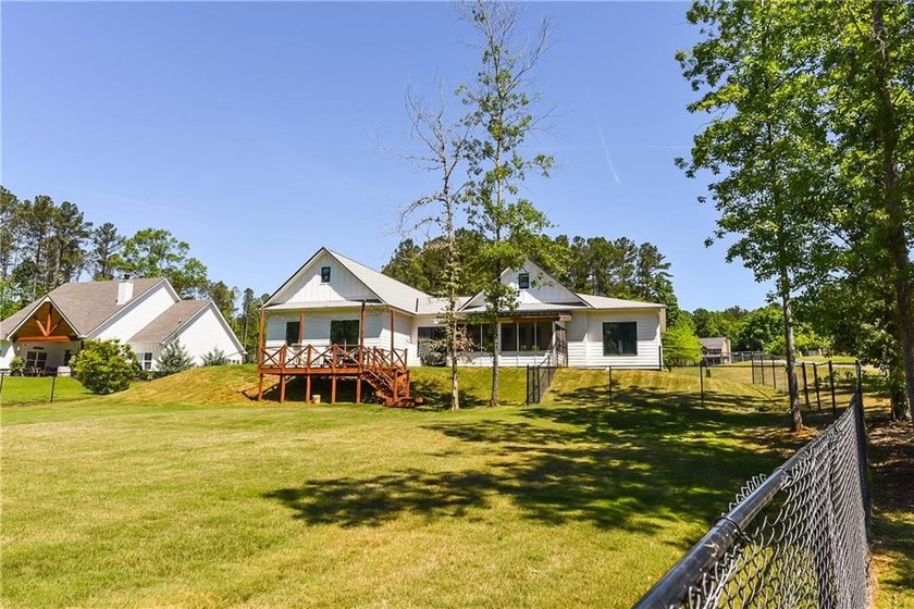 Welcome to your dream waterfront sanctuary on the highly coveted - photo 25