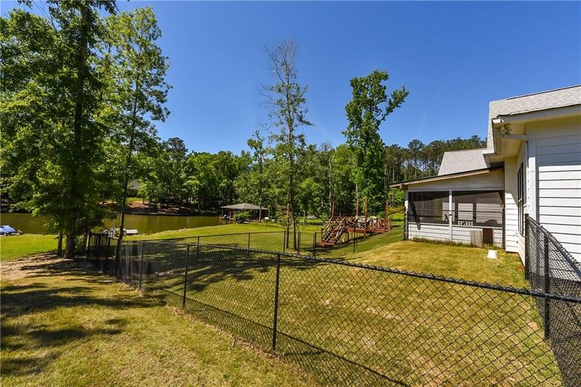 Welcome to your dream waterfront sanctuary on the highly coveted - photo 26