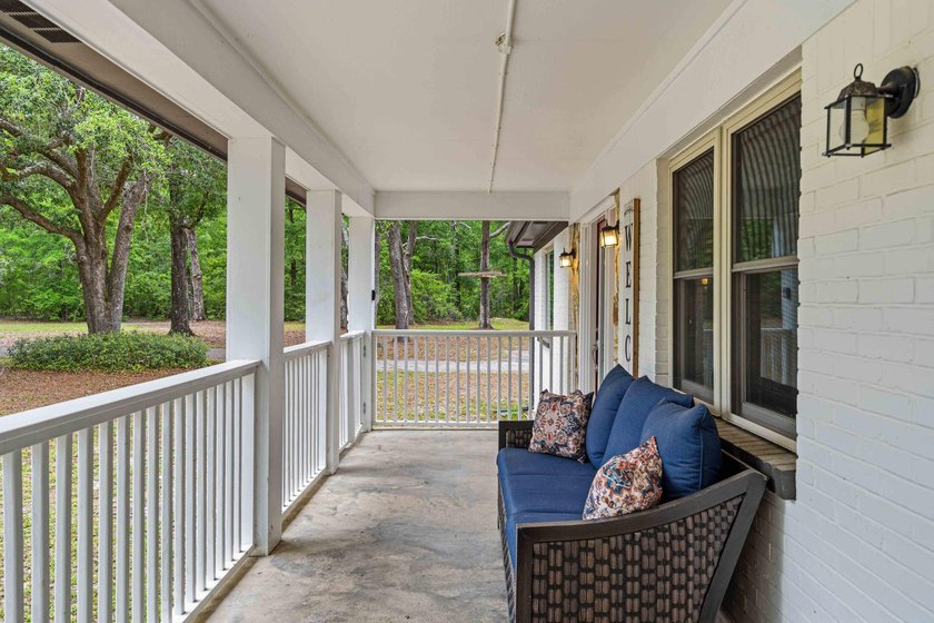 Step into a bright, split-layout ranch where the 2023 kitchen - photo 3