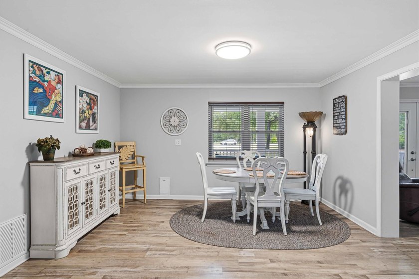 Step into a bright, split-layout ranch where the 2023 kitchen - photo 5
