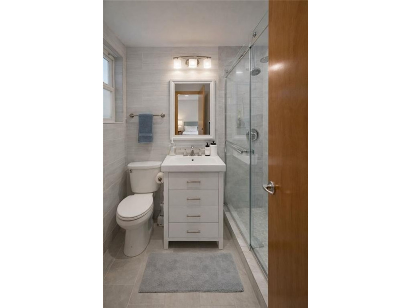 A beautifully renovated two-family residence in the heart of - photo 22