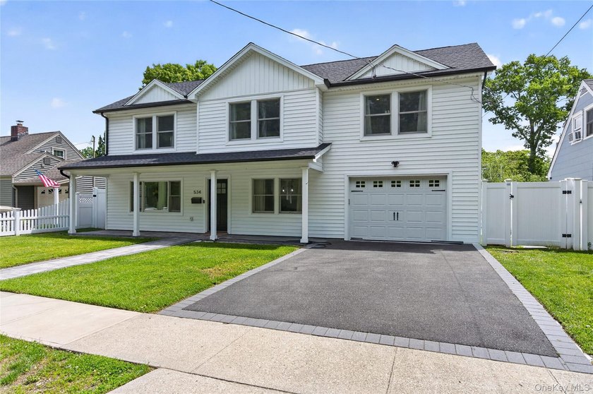 A Diamond, Completely Remodeled Colonial Located Mid-Block in - photo 2