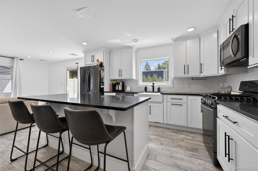 A Diamond, Completely Remodeled Colonial Located Mid-Block in - photo 9