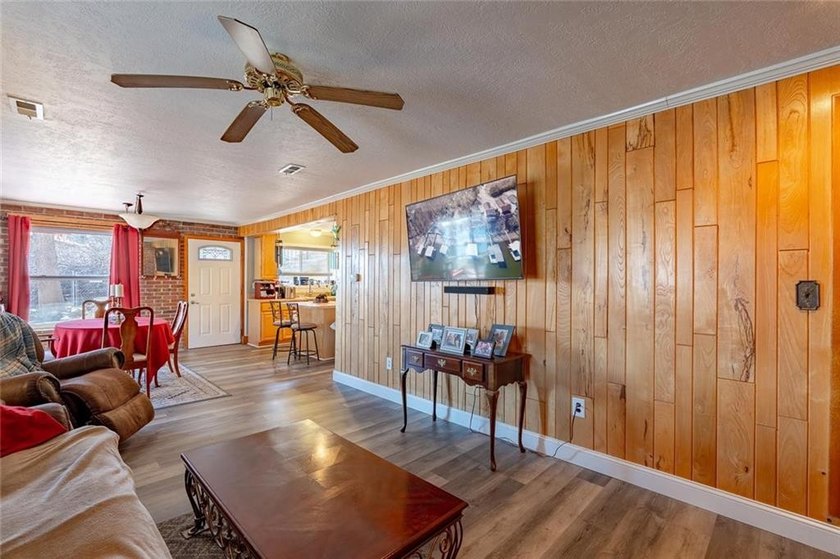 Nestled at the 8 MM in Buck Creek Cove, this lakefront retreat - photo 8