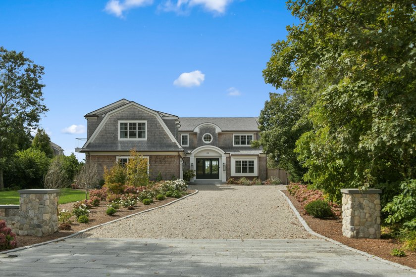 This stunning waterfront home is nestled within a coveted North - photo 2