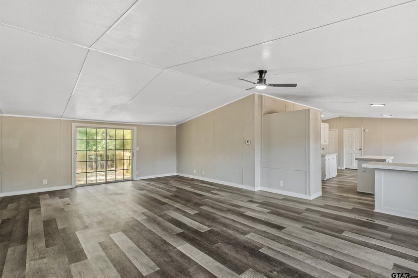 Welcome to this beautifully updated 4-bedroom, 2-bathroom mobile - photo 5