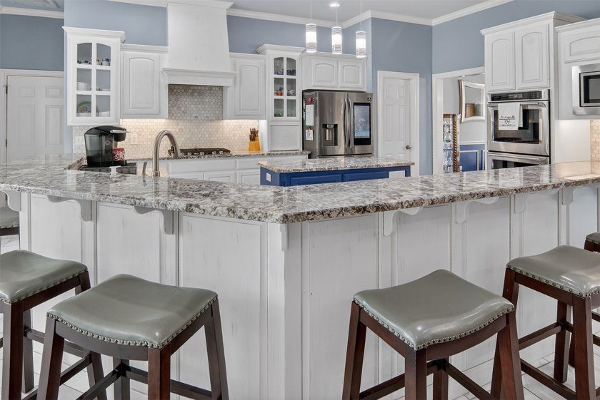 Welcome to this beautiful custom home on 1.6 peaceful acres in - photo 11