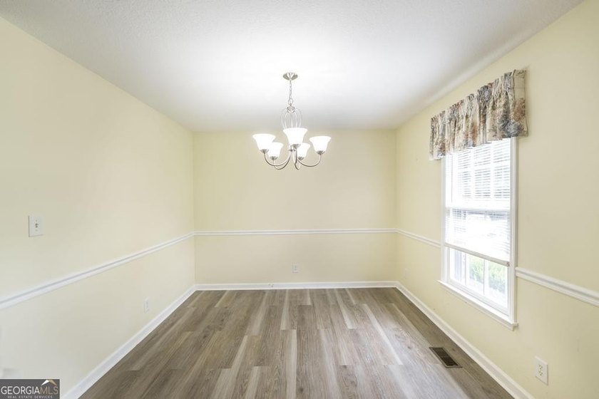 This move-in-ready, single-story 3-bedroom, 1.5-bathroom brick - photo 9