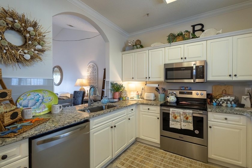 This well-maintained 2-bedroom, 2-bath condo offers a - photo 8