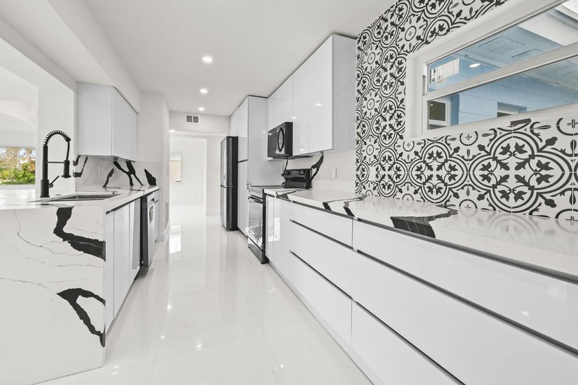 Escape to the quintessential coastal lifestyle in this - photo 9