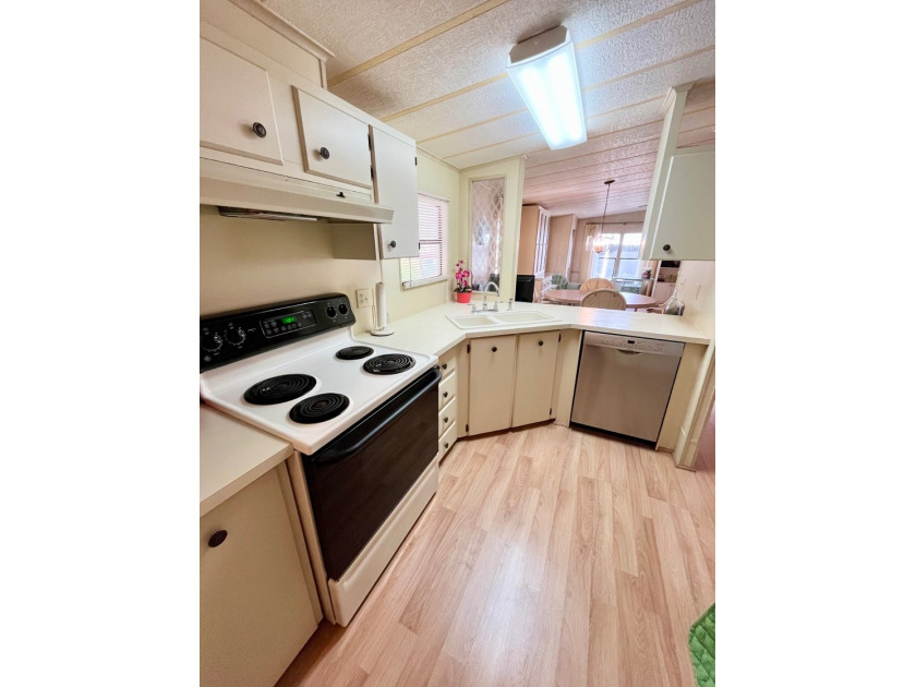 This two-bedroom, two-bath home located in the golf community of - photo 4