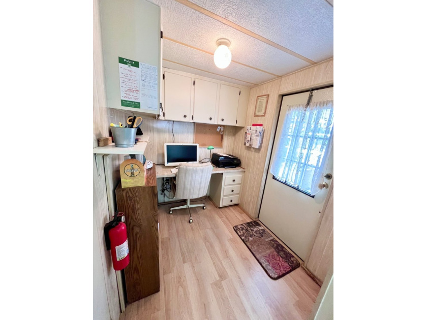 This two-bedroom, two-bath home located in the golf community of - photo 6