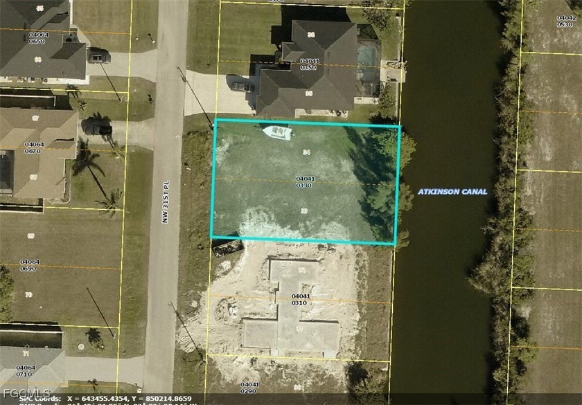 Freshwater canal homesite with seawall already in place, located - photo 2
