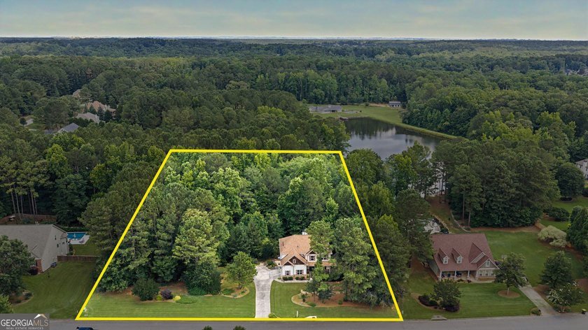 Welcome home to 120 Meadow View Glen, tucked away on a - photo 2