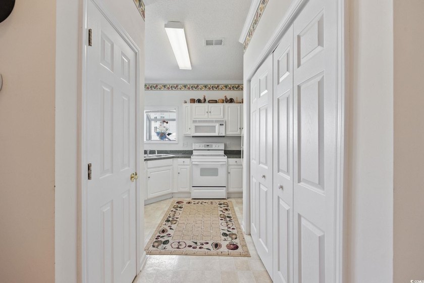 A rare opportunity to own a highly sought-after end unit in the - photo 11