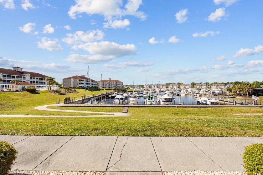 A rare opportunity to own a highly sought-after end unit in the - photo 22